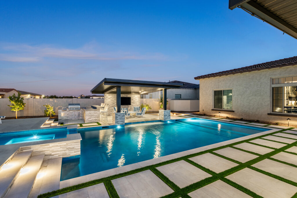 Modern residential swimming pool and backyard